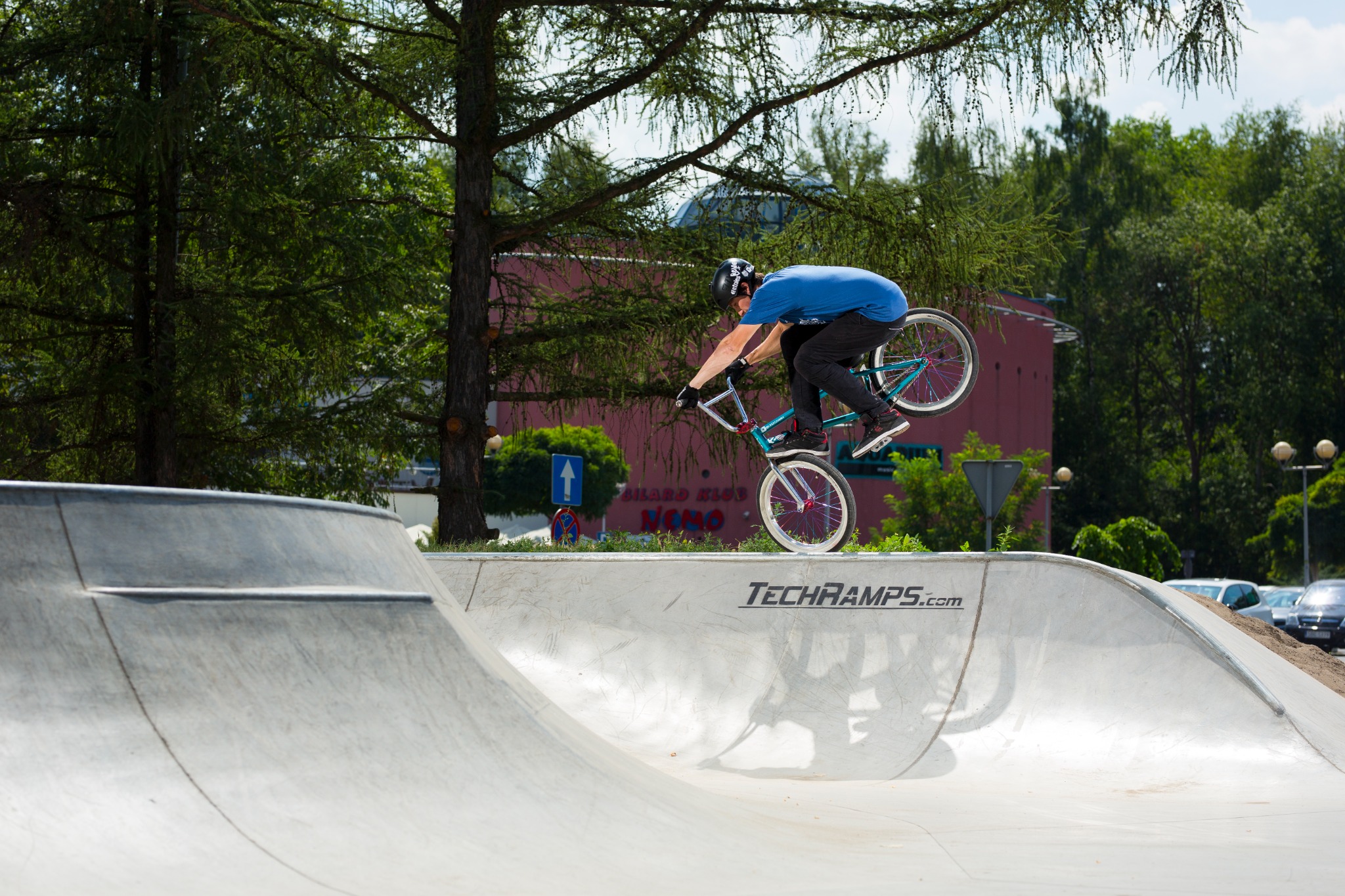 BMX rider in a concrete skatepark